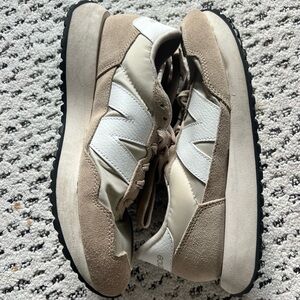 Beige and White New Balance Sneakers
